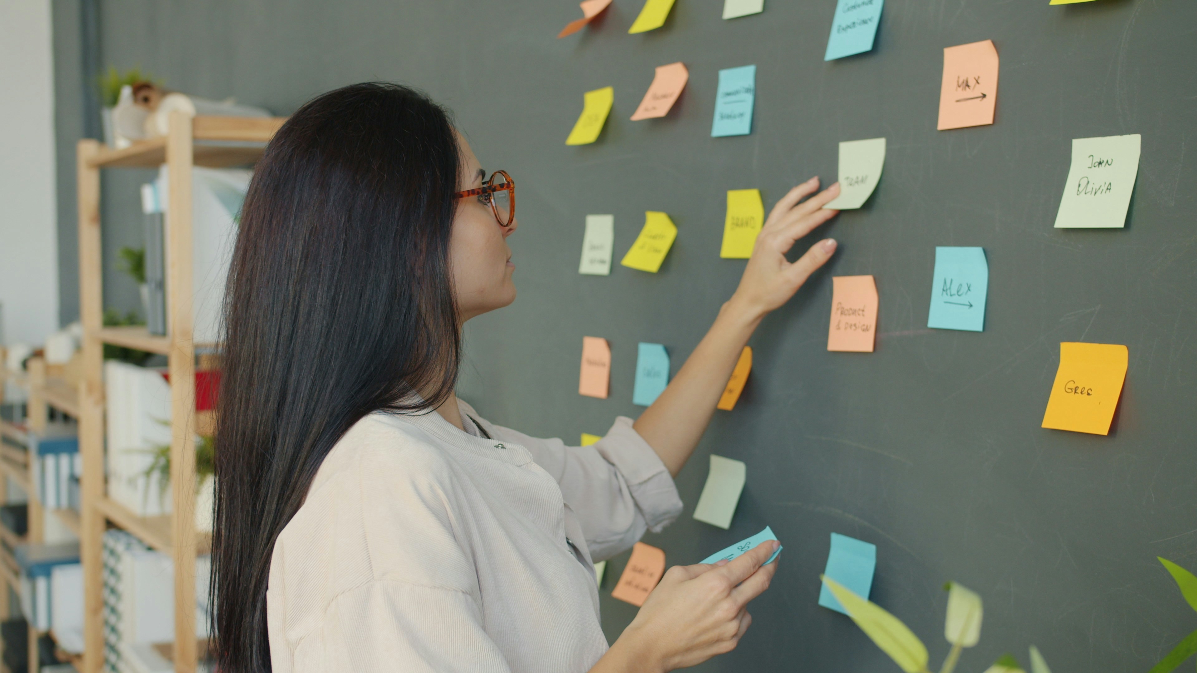 Planning session with sticky notes on a wall